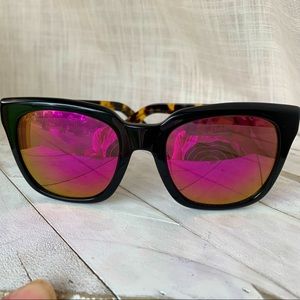 Maui Jim Heliconia Sunglasses with Maui Sunrise lenses.